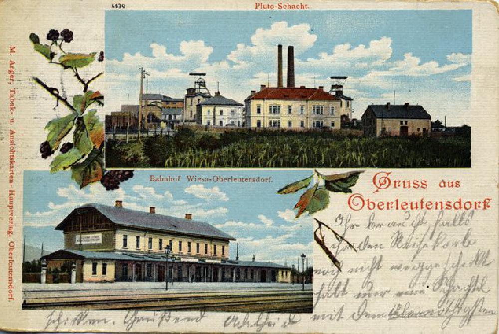 Historick� n�dra�� na pohlednici Bahnhof und Plutoschacht p�ipom�n� star�� D�l Pluto I.